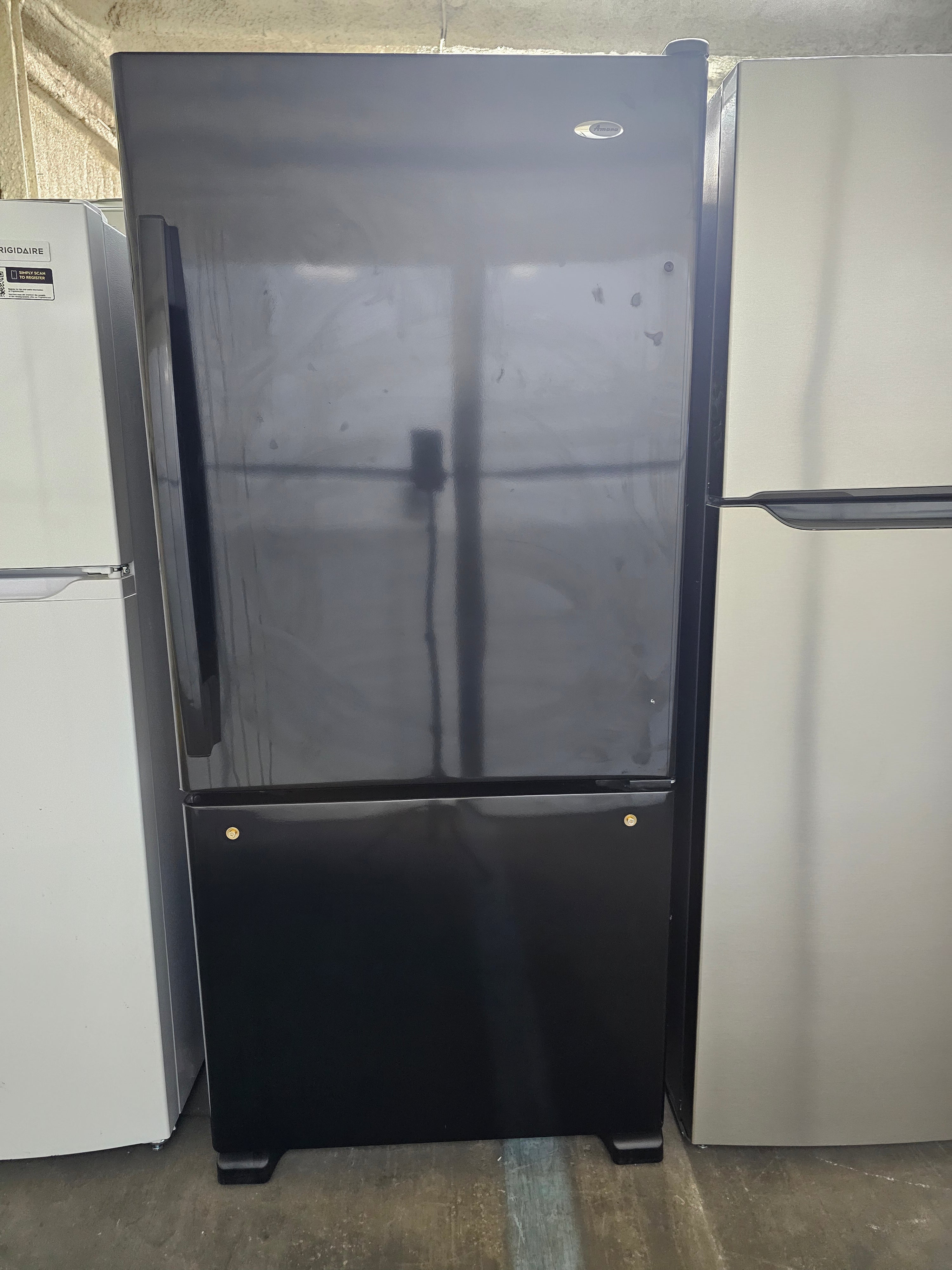 Amana 18 cu. ft. Bottom Freezer Refrigerator in Black