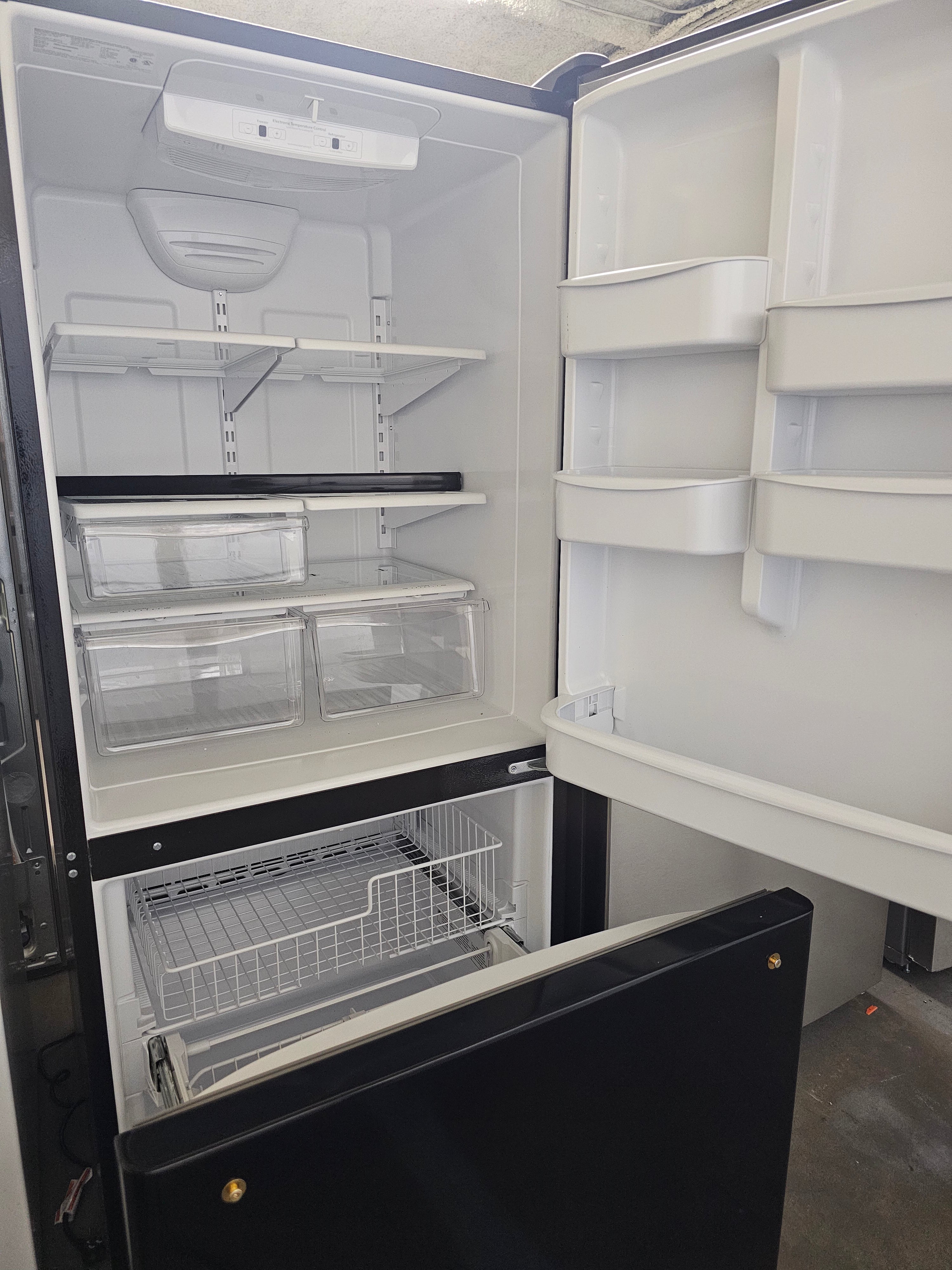 Amana 18 cu. ft. Bottom Freezer Refrigerator in Black