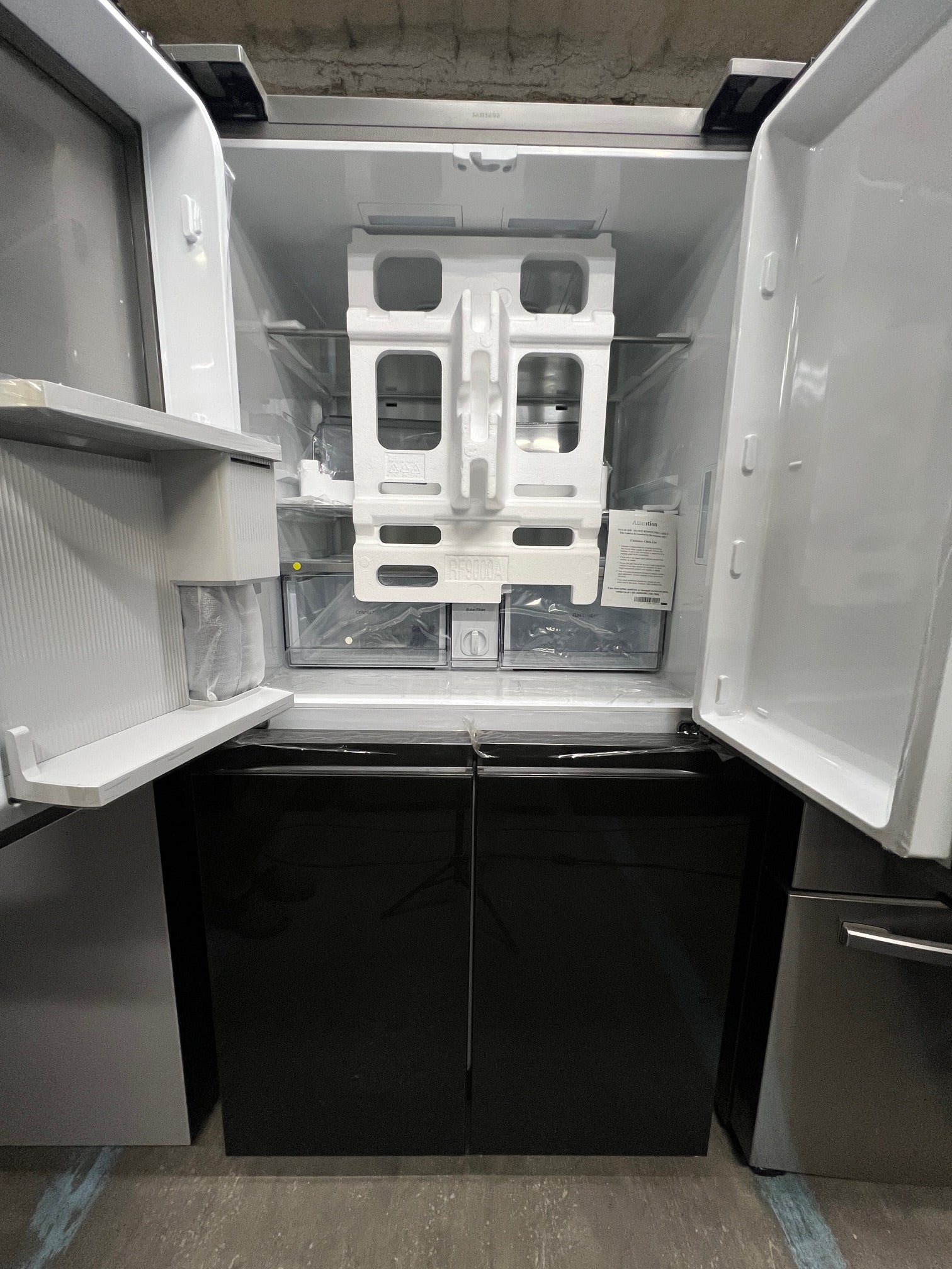 Samsung Bespoke29 cu. ft. 4-Door Flex Refrigerator with Family Hub+ in Black