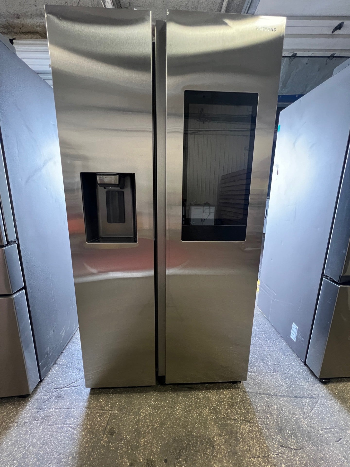 Samsung Family Hub 26.7-cu ft Side-by-Side Refrigerator Smart Compatible with Ice Maker ,Water and Ice Dispenser